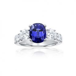 Bold triology sapphire ring with diamond band