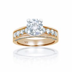 Modern 4-Claw engagement ring with grain set diamond band