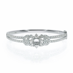 18kt white gold diamond bouquet bangle with twin pave set band